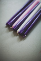 purple, pink, and white advent candles 