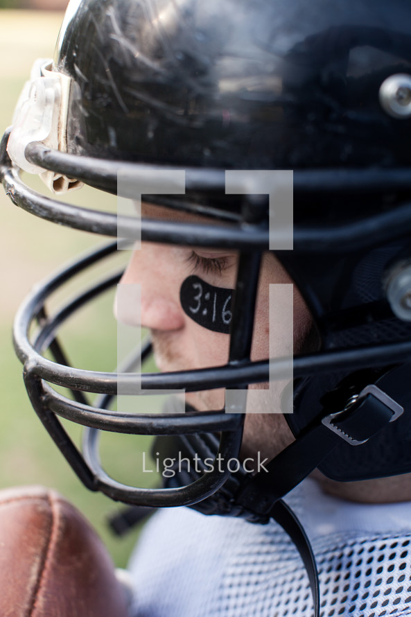 football player wearing a helmet 