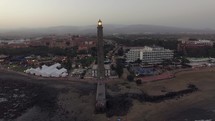 Gran Canaria coastal resort with lighthouse, aerial