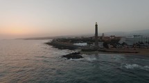 Gran Canaria coastal resort with lighthouse, aerial
