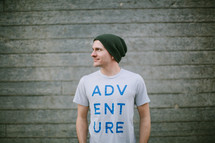 man wearing an Adventure t-shirt