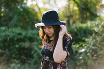 portrait of a teen girl in a hat