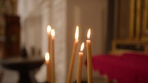 Prayer candles inside a Christian church