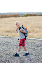 a boy exploring the outdoors 