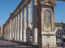 MILAN, ITALY - MARCH 28, 2015: Colonne di San Lorenzo meaning St Lawrence columns, ancient Roman ruins Milan Italy