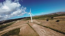 wind power plant generator on the mountains, aerial view fpv