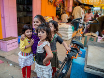 children in a market in Mandawa, India 
