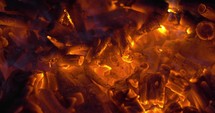 Wood embers in campfire or fireplace