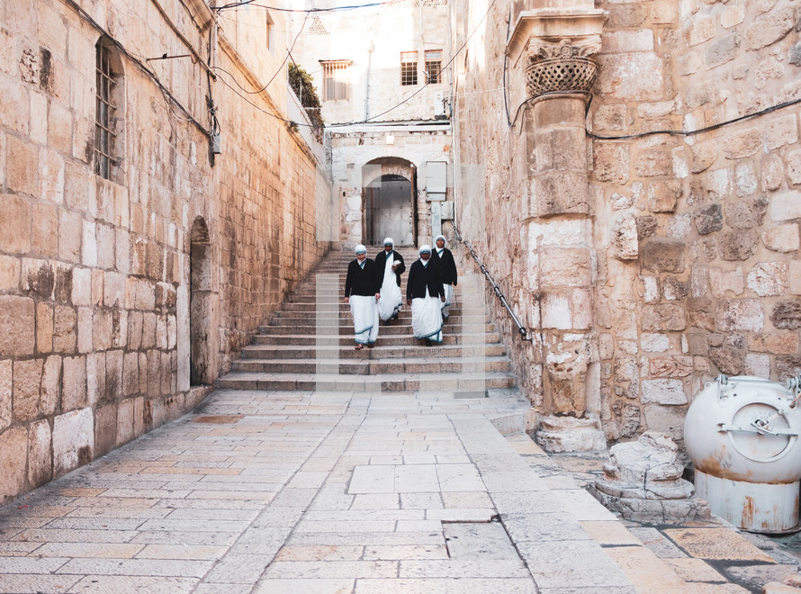 nuns walking on the sidewalks of Jerusalem 