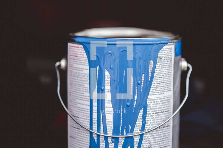 blue paint in a paint can 