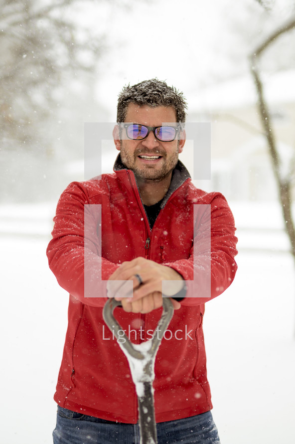 a man shoveling snow 