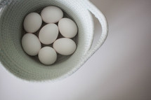 fresh eggs in a basket 