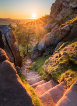 The descending stairs of The Roaches at sunset.
