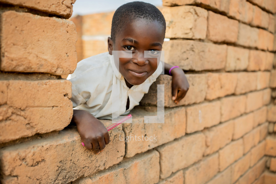 Happy African child smiling to the camera