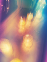 blurry image of votive candles 
