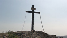 Cross with ropes and inscription
