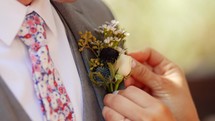 boutonniere on a groom 