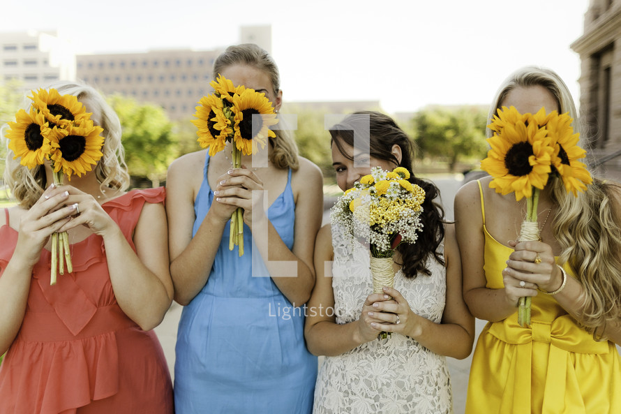 Women holding flowers
