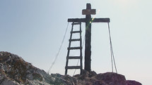 Cross with ladder and ropes
