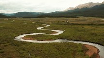 Aerial drone flying over the Taylor River in the Colorado Rocky Mountains. 