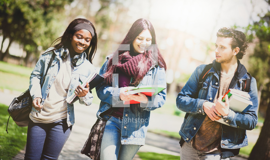 three students walking to class 