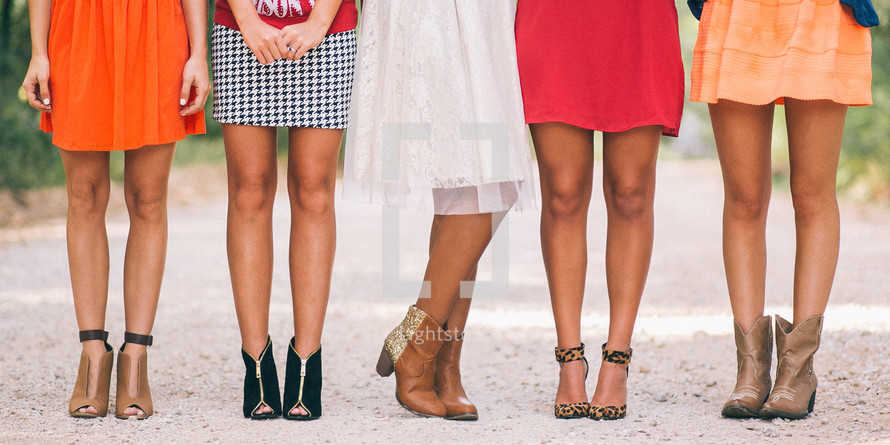 young women with tanned summer legs 