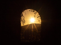 Sunset Over Landscape Through an Ancient Window, Ireland