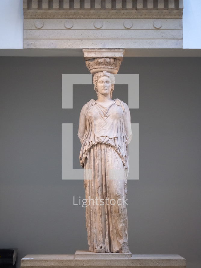 LONDON, UK - CIRCA SEPTEMBER 2019: Caryatid from the Erechtheum of Athens Acropolis, pentelic marble, about 415 BC, at the British Museum