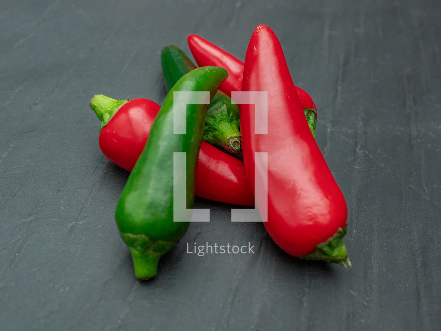 Red and Green Chilies on a Slate