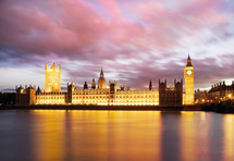 Big Ben and the Houses of Parliament from across the river thames at dusk. London. England.