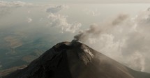 Volcan de Fuego During Eruption With Smoke And Dust In Guatemala - aerial drone shot	