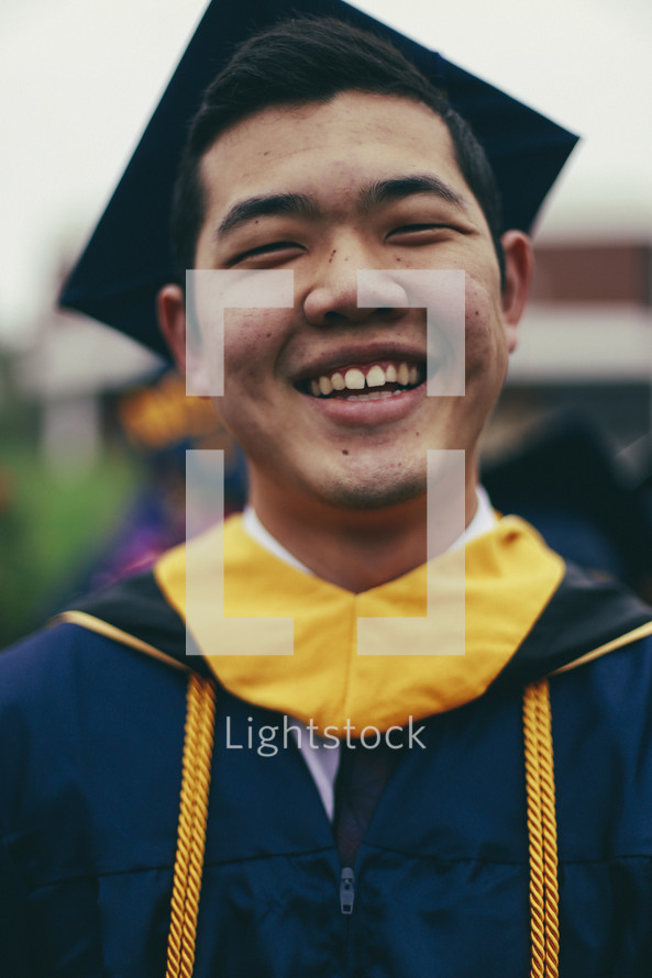 A smiling graduate 