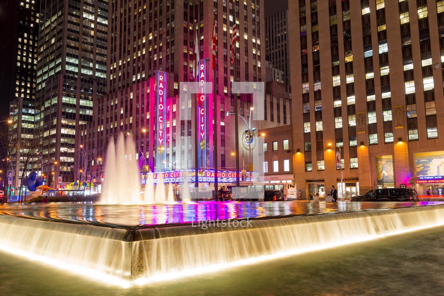 fountain in New York City at night 