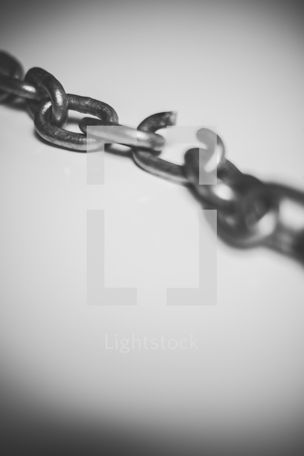 Chain with a broken link.