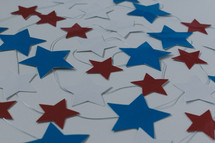 red, white, and blue stars on string 