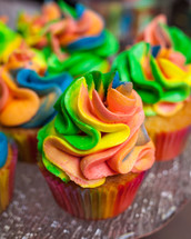 colorful icing on cupcakes 