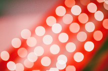 red and white bokeh lights background 