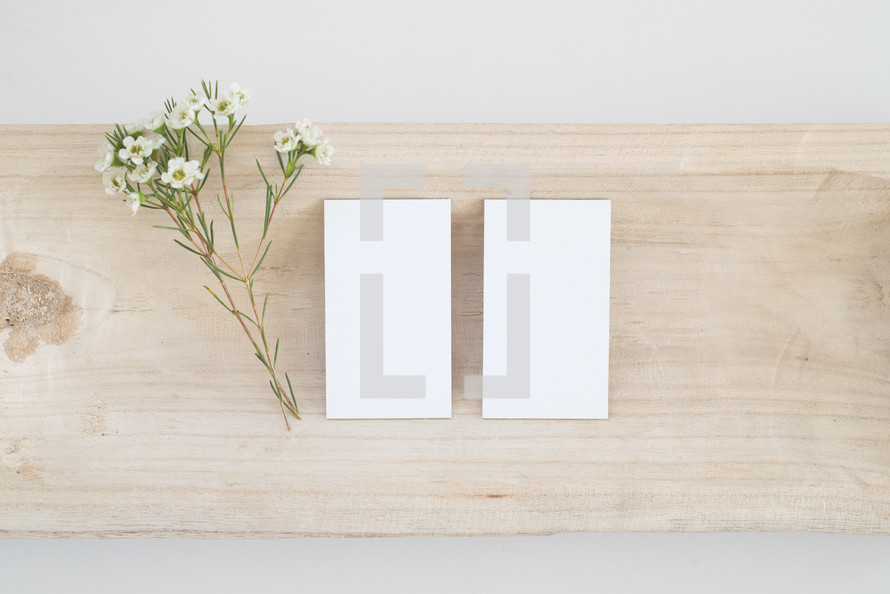 blank, white, notecard, paper, flowers, wood countertop 
