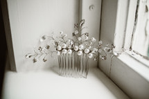 pearl and silver hair clip for a bride at a wedding 