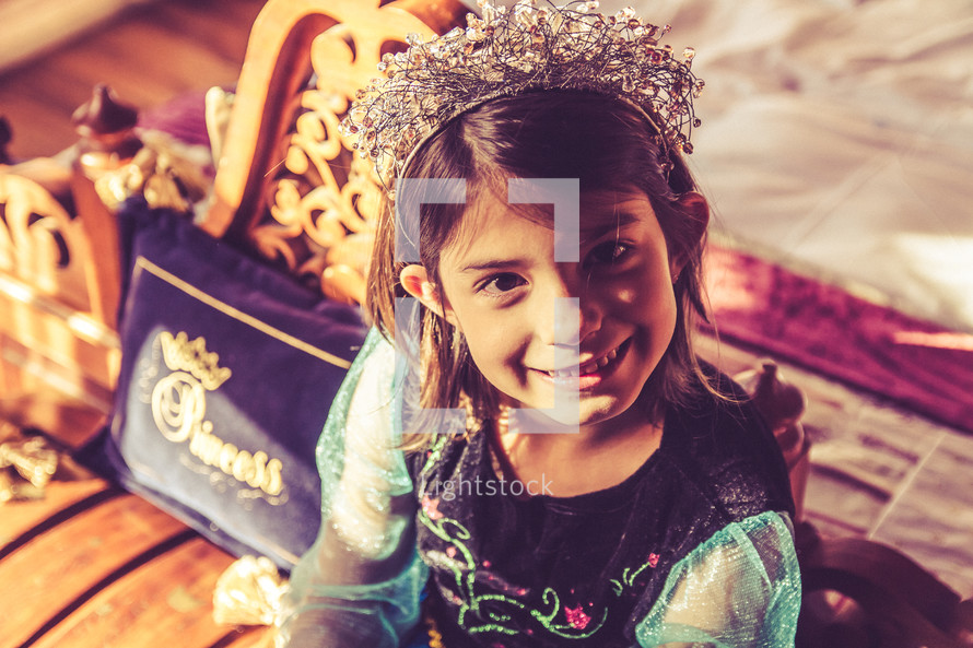 a child dressed up as a princess 