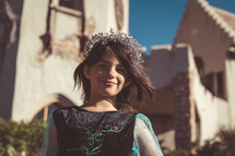 A little girl dressed like a princess 