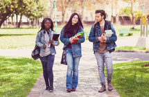three students walking to class 