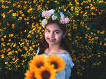 teen girl in a field of flowers 