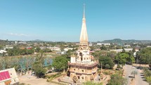 Wat Chalong Buddhist Temple in Mueang Phuket District in Thailand - Aerial Panoramic Orbit shot