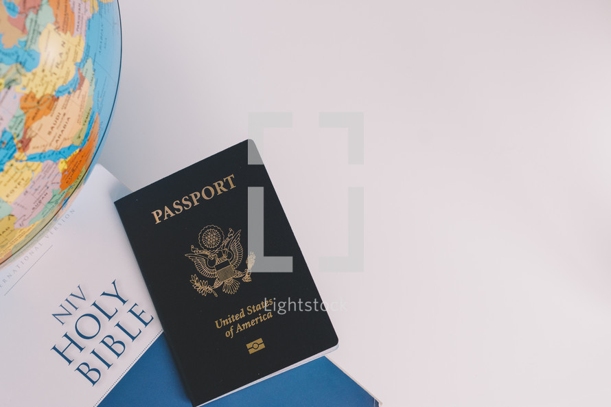 Bible, Passport, and globe 