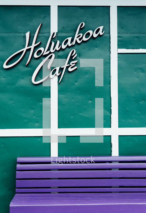 Holuakoa Café sign and purple bench 