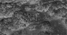 Drone with thermal night vision camera view of soldiers walking during war