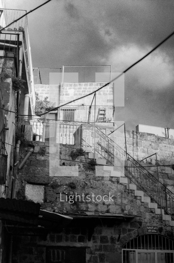 Buildings and staircase in Israel - Black and white