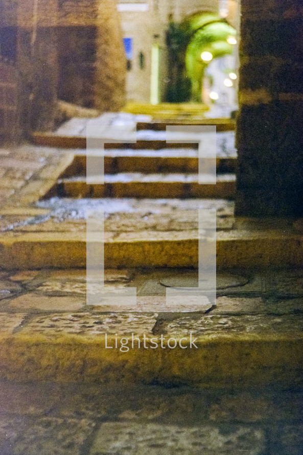 Stone steps to arched walkway in Israel