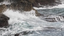 Slow motion of waves crashing into rocks in the Caribbean.